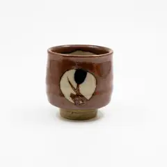 Mashiko Pottery, Yunomi (tea cup), stoneware with kaki glaze and wax resist panels with brushwork decoration