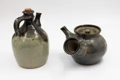 Barry Brickell, Wine flagon and teapot, glazed stoneware, the flagon with original cork stopper; the teapot with typical side handle