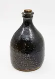 Barry Brickell, Wine bottle, stoneware with speckled dark salt glaze, original cork stopper