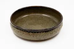 Barry Brickell, Large fruit bowl, stoneware with oatmeal glaze over saturated iron glaze, impressed decorative pattern to outer rim
