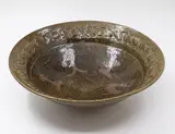 Barry Brickell, Table bowl, stoneware with ash glaze and tenmoku wax resist design to the centre, impressed decorative pattern to the rim