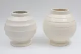 Ernest Shufflebotham for Crown Lynn, Two hand-potted spherical vases, with white cream glaze, shape no. 14 and 15 (AF)