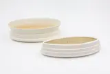 Two ribbed trough vases by Crown Lynn Potteries, white slip-cast ceramic, offered Feb 2026