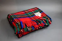 Kaiapoi Petone Group Textiles, Clan travel rug, with a Royal Stewart tartan pattern in bright red, blue, green, yellow, black and white