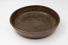 Barry Brickell, Table bowl, stoneware with tenmoku glaze with blue-grey highlights, impressed decorative pattern to the rim