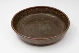 Barry Brickell, Table bowl, stoneware with tenmoku glaze with blue-grey highlights, impressed decorative pattern to the rim