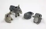 Tristan Totty, Two racoons, a seal and a donkey, ceramic figurines