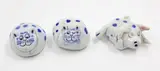 Tristan Totty, Two blue and white cats and a pig, ceramic figurines