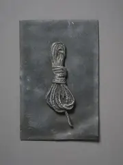 String by Greer Twiss, lead and cast aluminium (1974), sold Feb 2026