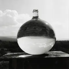Bill Culbert, Bonbonne with Landscape, gelatin silver print, 10/25