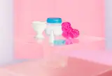 Emily Hartley-Skudder, Plastic Miscellany Displayed with Pink, oil on linen
