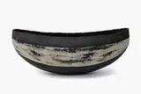 Raewyn Atkinson, Trade: A Fine Art, stoneware with matt white abstract design on a black ground, the interior with a printed inscription with the terms that Captain James Cook determined for trading in the Pacific