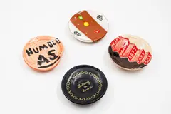 Andy Kingston, Four small wall dishes, hand-painted earthenware
