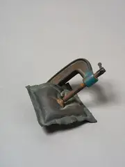 Untitled - Cushion and Vice by Greer Twiss, cast bronze and found vice, sold Jun 2025