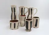 Set 2002 by Martin Poppelwell and Minerva Betts for Paint Department, painted and glazed earthenware, sold May 2025