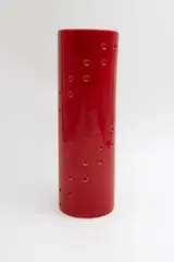 Red spotted cylinder by John Parker, red glazed ceramic, offered May 2025