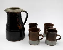 Peter Stichbury, Water jug and four coffee cups, stoneware with tenmoku and grey ash glazes