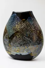 Garry Nash, Large flattened vase, blown black glass with scribble design on a gold leaf ground