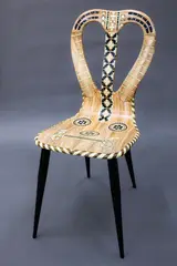 Fornasetti Milano, Vintage Musicale chair, lithographically printed and hand coloured lacquered wood, with metal tubular legs, designed in 1951, manufactured in 1989