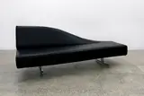 An ‘Aspen’ sofa by Jean-Marie Massaud for Cassina, in black leather, simple elegant design with tapering back rest creating unique floating effect, on two point chromium p, sold May 2025