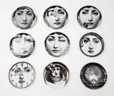 Fornasetti Milano, Nine Tema & Variazioni Coasters, hand-decorated porcelain (one chipped)