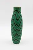 Modernist ceramic vase by Alvino Bagni for Anthropologie, of tall slender form, decorated with zigzag design (small flake chip), offered May 2025