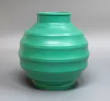 Keith Murray for Wedgwood, Matt green spherical vase, with lathe turned concave bands