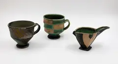 Jeff Oestreich, Two mugs and a beaked creamer, soda fired stoneware