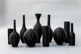 John Parker, Vortex Ware Still Life, shiny black glazed porcelain, 10 parts
