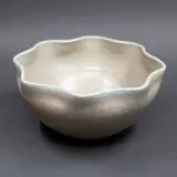 Graeme Storm, Frilled rim bowl, with rutile pale blue and grey glaze