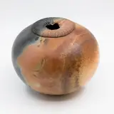 Jo Munro, Raku fired vase, of globular form with mushroom shaped rim