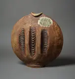 Len Castle, Large and impressive Discoid vase, press moulded stoneware washed with yellow ochre pigment and burnt umber, 1980s