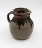 Barry Brickell, Small Fatso jug, stoneware with poured persimmon and dark grey glazes over an oatmeal crackle ground