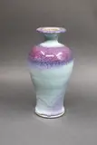 Graeme Storm, Baluster vase, porcelain with jun glaze of pale blue colour with purple highlights