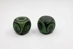 Anneke Borren, Matched pair of cubes, high fired earthenware with abstract spiral designs in black and green