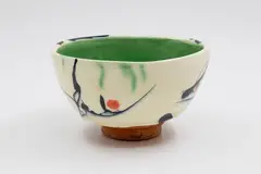 Campbell Hegan, Abstract terracotta bowl, raised on an unglazed foot, the sides with a thick layer of white glaze with abstract decoration, the interior glazed in green
