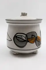 John Crawford, Hand-painted lidded jar, decorated with stylised fruit design