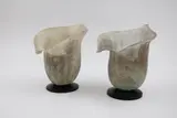 Murano Glass, Two scavo glass vases, on black glass base