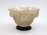 Murano Glass, Scavo glass bowl, with impressed lion head prunts on black glass base