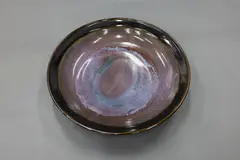 Large wall charger by Graeme Storm, stoneware with jun over tenmoku glazes (with hanging wire), offered May 2025