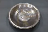 Graeme Storm, Large wall charger, stoneware, manganese glaze with gloss gold highlights (with hanging wire)