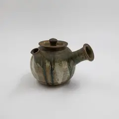 Bronwynne Cornish, Early teapot, glazed stoneware with floral decoration