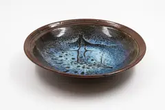Doris Dutch, Stoneware dish, jun over tenmoku glazes
