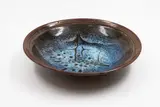 Doris Dutch, Stoneware dish, jun over tenmoku glazes