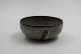 Small bowl by Len Castle, stoneware with matt mottled grey glaze over iron glaze, sold May 2025