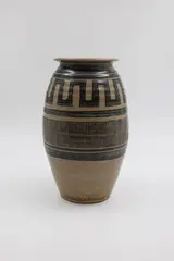 Jack Laird, Tall stoneware jar, with dark grey and tan glazes with wax resist geometric design