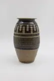 Jack Laird, Tall stoneware jar, with dark grey and tan glazes with wax resist geometric design
