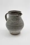 Stoneware jug by Len Castle, matt grey glaze over iron glaze, sold May 2025
