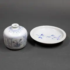 Small blue and white jar, with matching pin dish by Graeme Storm, porcelain, offered May 2025