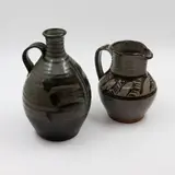 Peter Stichbury, Stoneware wine bottle and jug, with similar over saturated iron glaze and grey glazes